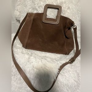 TMRW studio Milano suede clutch bag